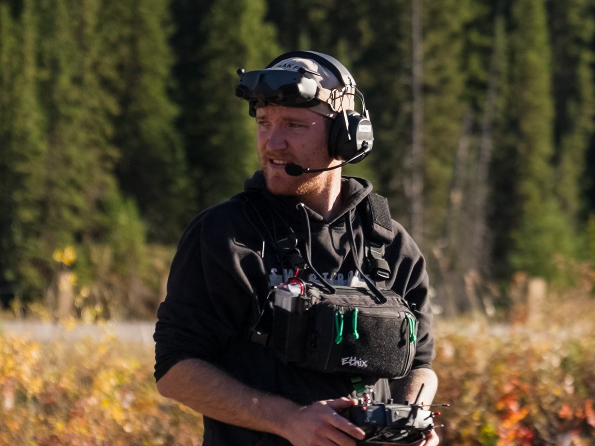Peak FPV pilot flying an FPV drone on location in Alberta